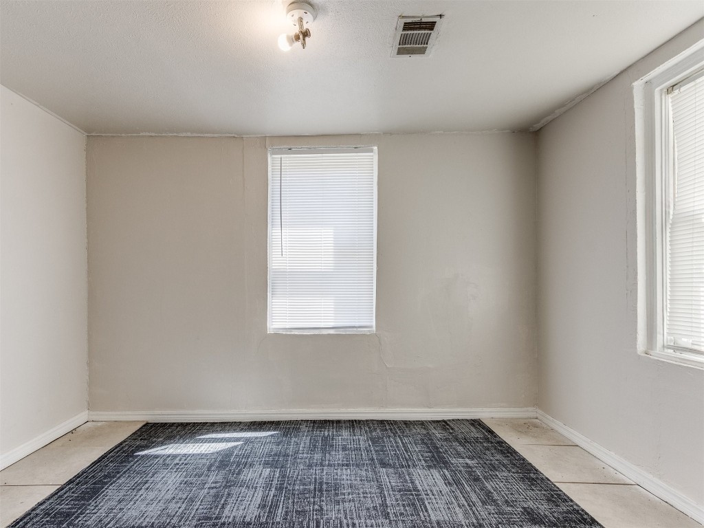 4900 S Blackwelder Avenue, Oklahoma City, OK 73119 view of tiled spare room