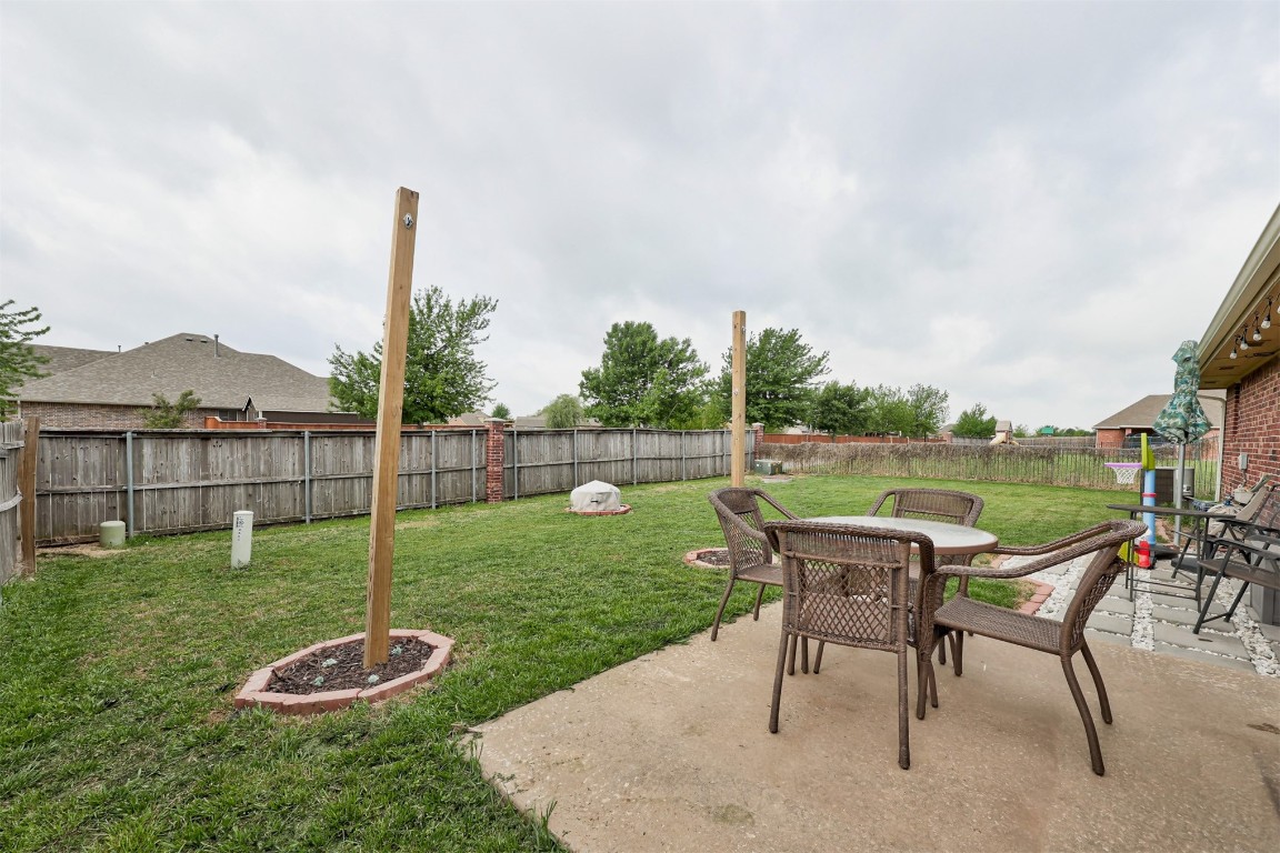 4604 SW 122nd Street, Oklahoma City, OK 73173 view of yard with a patio
