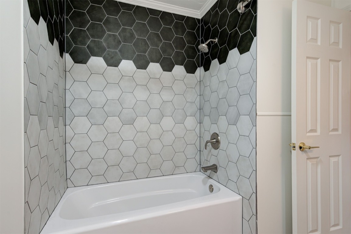 19605 Harness Court, Edmond, OK 73012 bathroom featuring ornamental molding, double sink vanity, tile flooring, and toilet