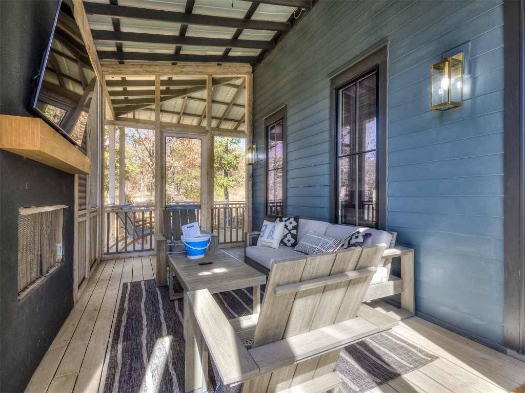 96 Walk in the Woods Lane, Carlton Landing, OK 74432 sunroom with lofted ceiling with beams