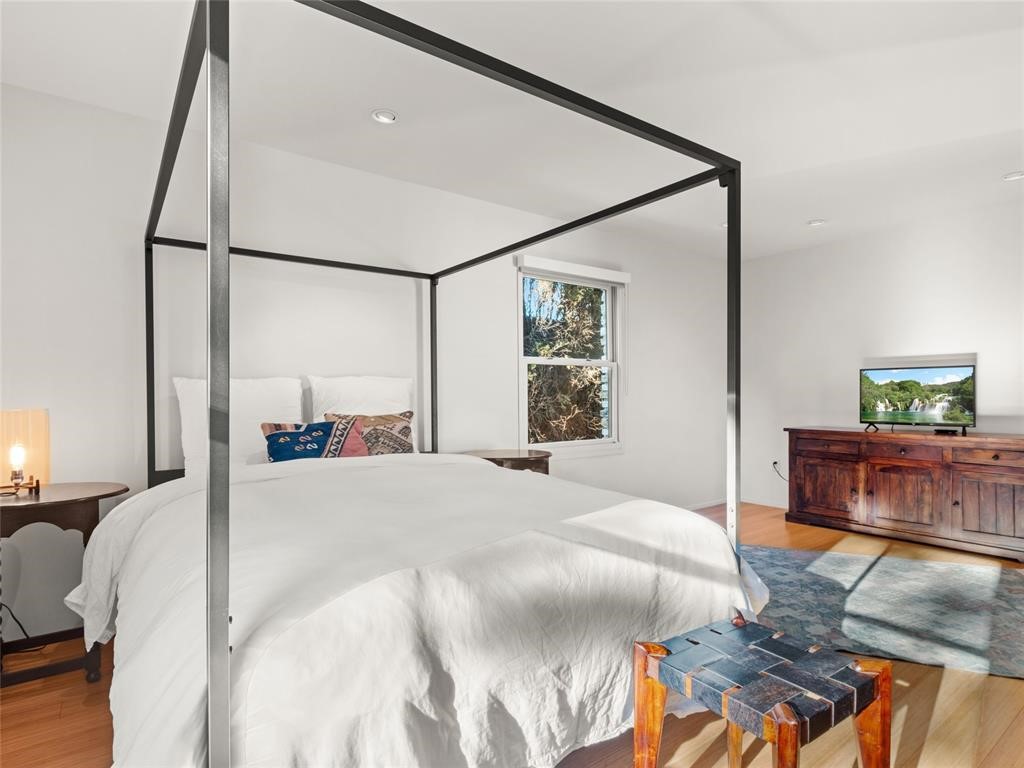 6614 N Pennsylvania Avenue, Nichols Hills, OK 73116 bedroom featuring light hardwood / wood-style flooring