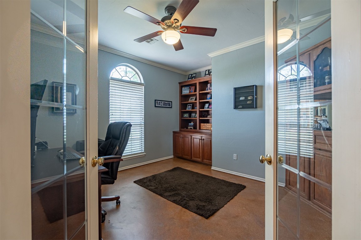 314 NW Cypress Street, Piedmont, OK 73078 carpeted office featuring ceiling fan, crown molding, and french doors