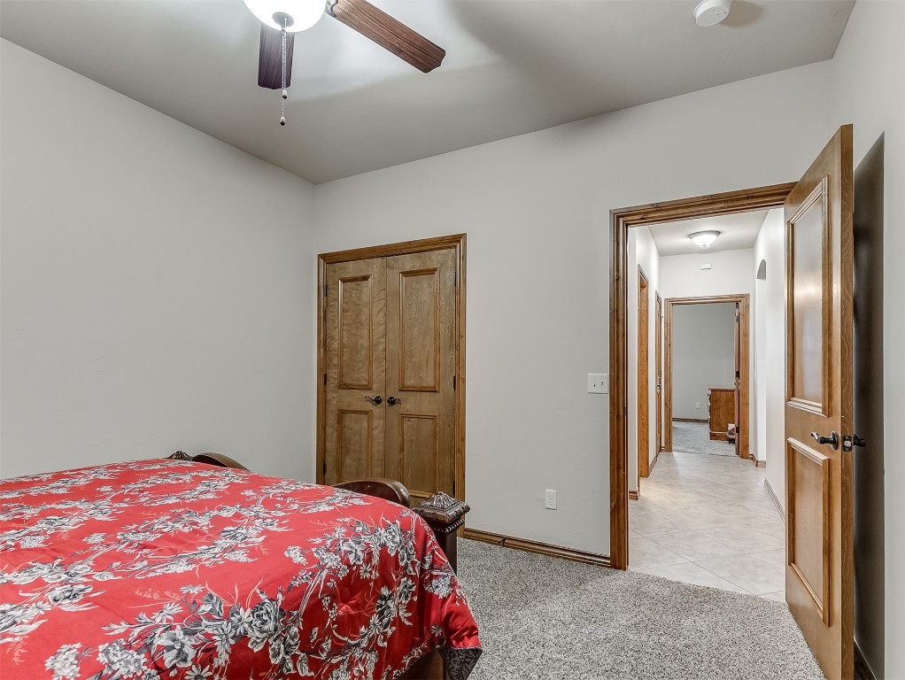 519 Harold Drive, #NE, Piedmont, OK 73078 tiled bedroom with ceiling fan