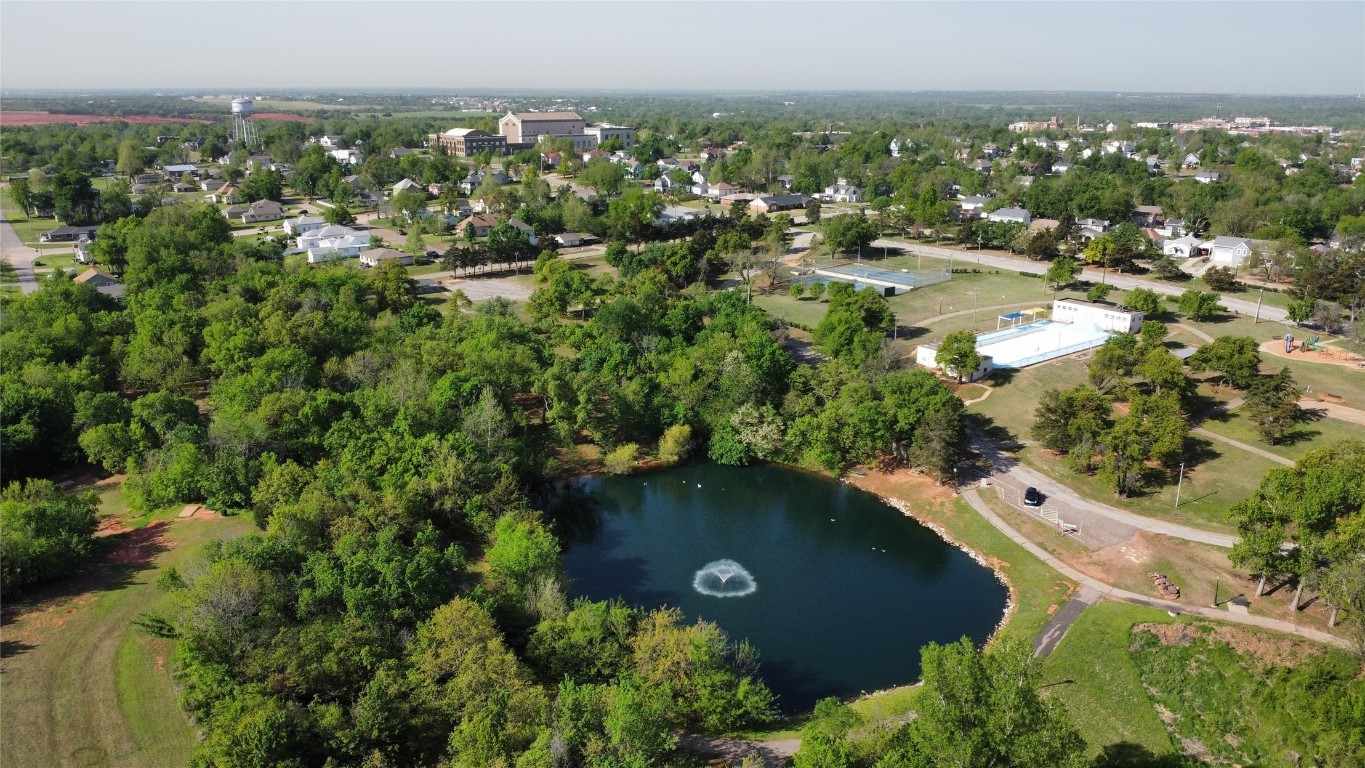 1218 Clydesdale Drive, Guthrie, OK 73044 drone / aerial view with a water view