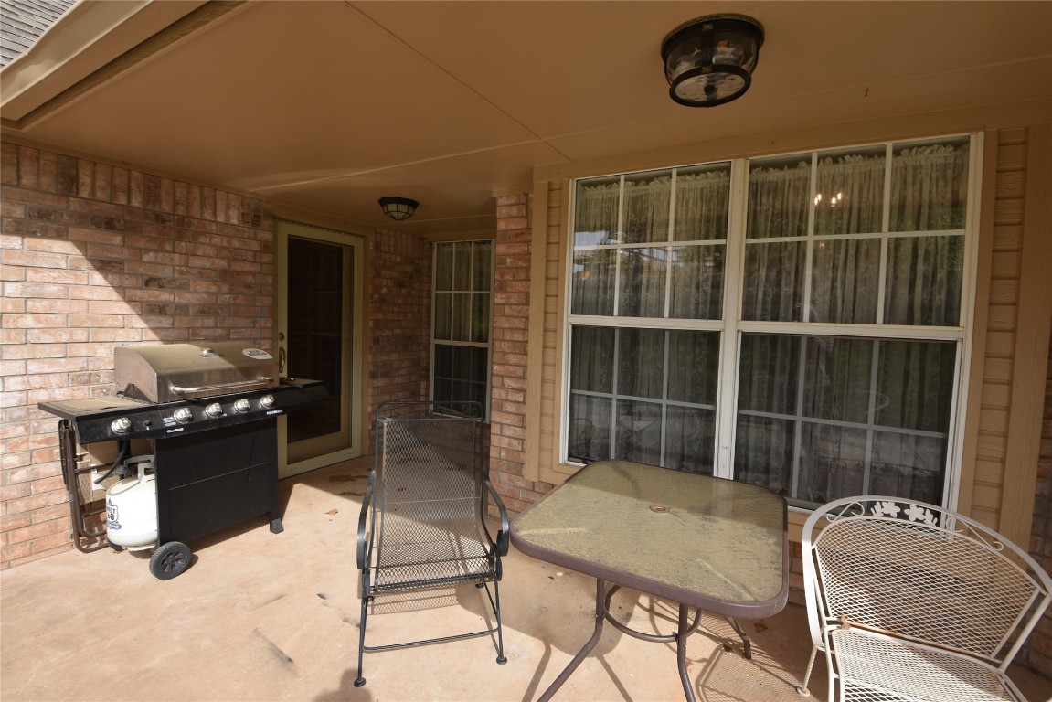 4200 Ainsley Court, Edmond, OK 73034 view of patio / terrace featuring grilling area