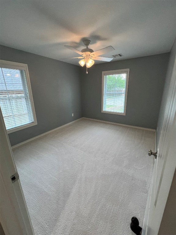2611 Cambridge Court, Oklahoma City, OK 73116 carpeted spare room featuring ceiling fan