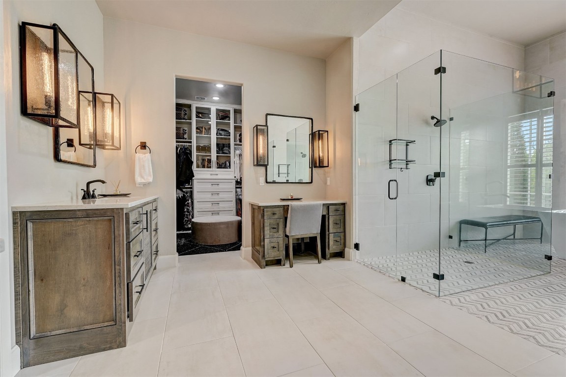3217 Novara Drive, Arcadia, OK 73007 bathroom featuring tile flooring, walk in shower, and vanity