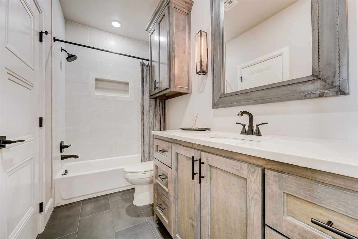 3217 Novara Drive, Arcadia, OK 73007 full bathroom with shower / bath combo, toilet, tile flooring, and vanity