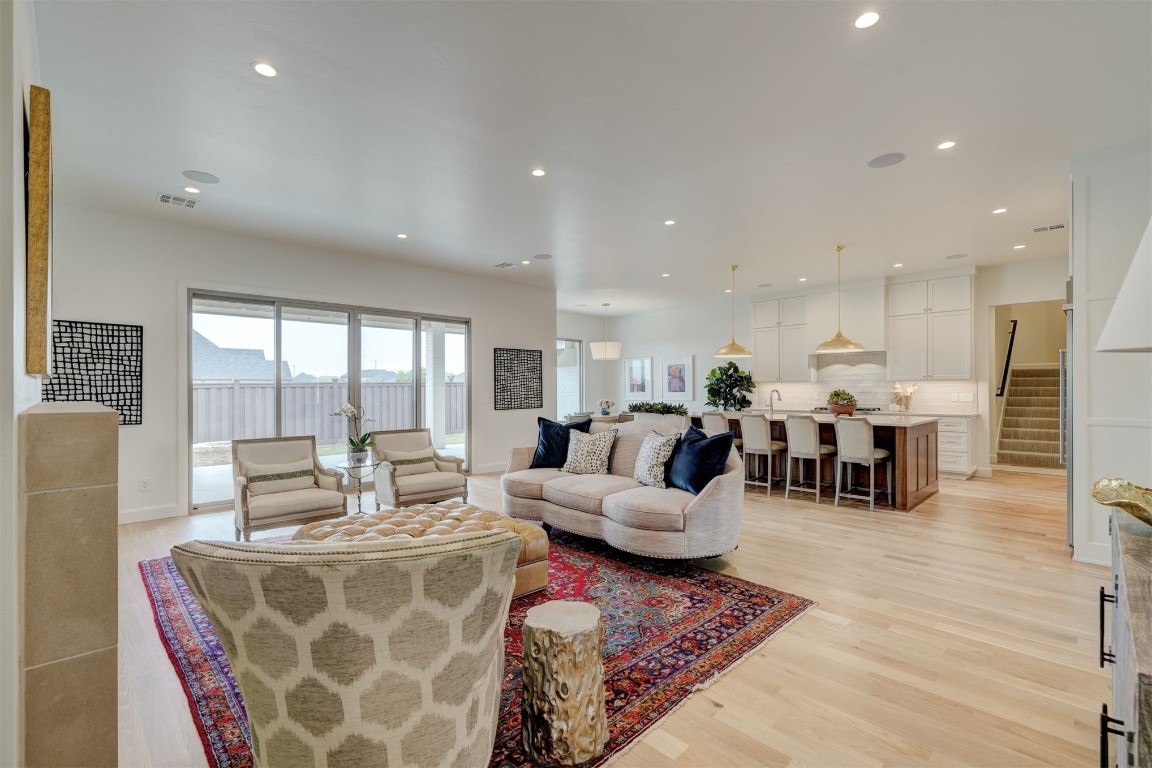 6416 NW 150th Terrace, Oklahoma City, OK 73142 living room with light wood-type flooring