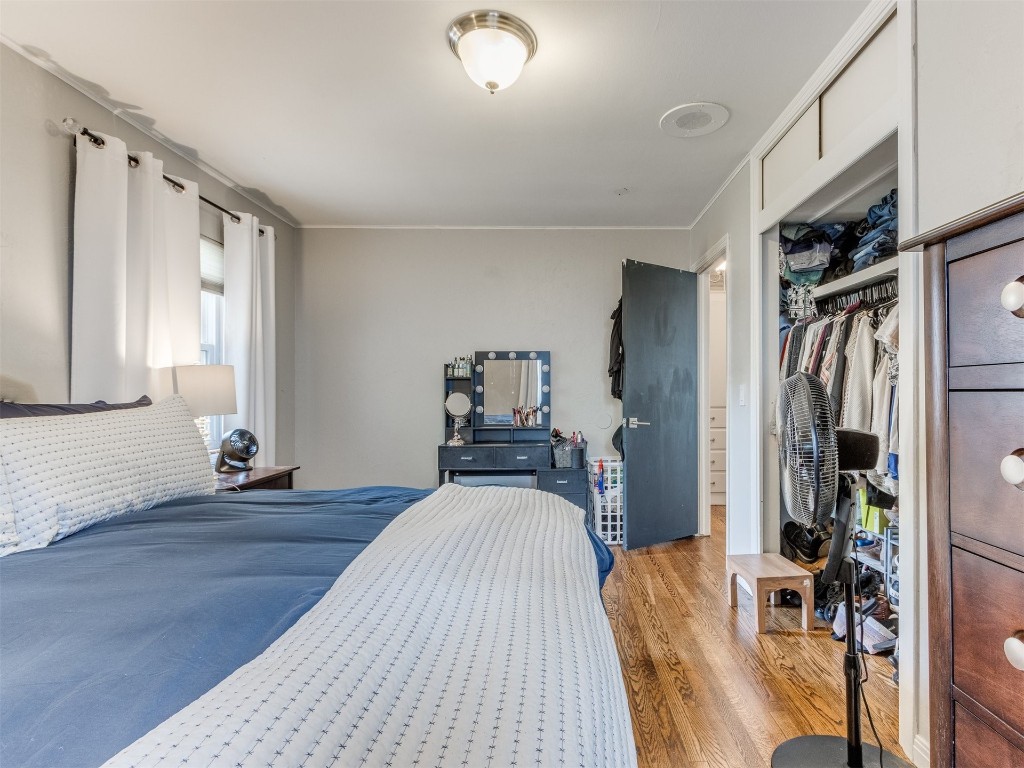 9537 Greystone Avenue, Oklahoma City, OK 73120 bedroom with a closet and light wood-type flooring
