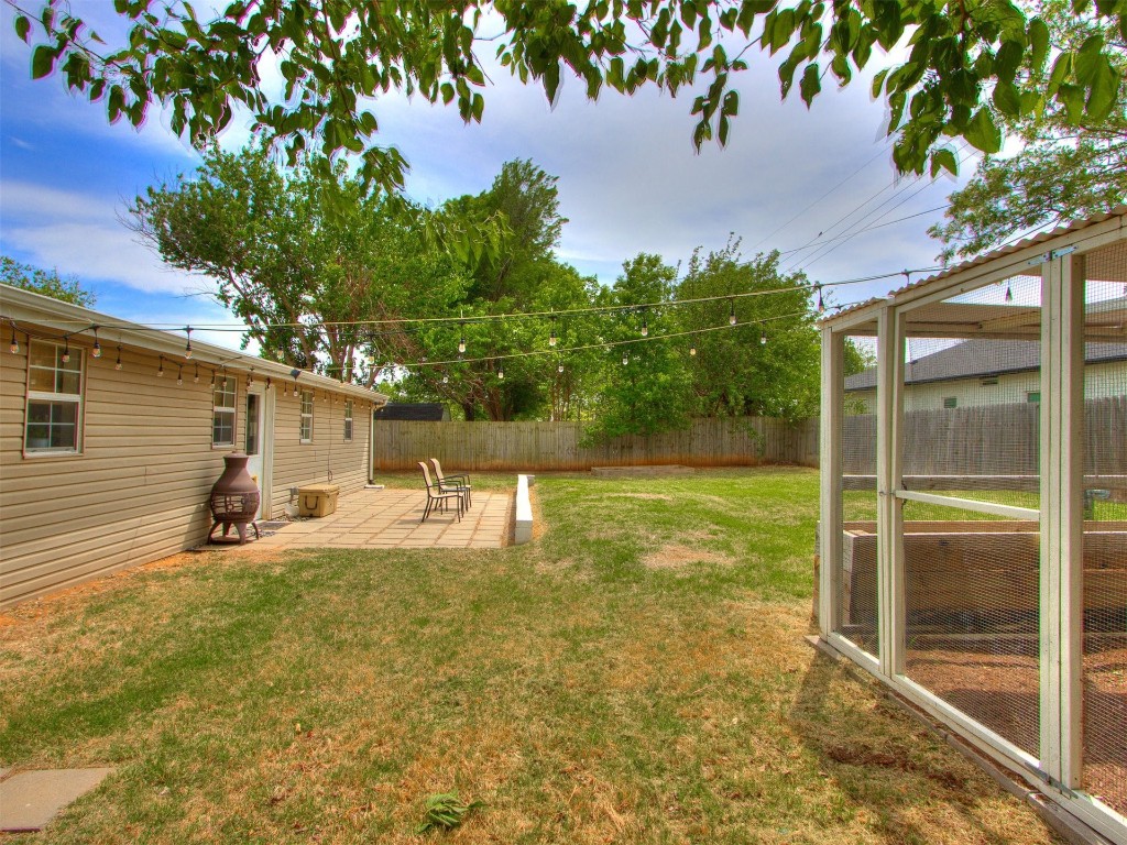 9537 Greystone Avenue, Oklahoma City, OK 73120 view of yard featuring a patio area