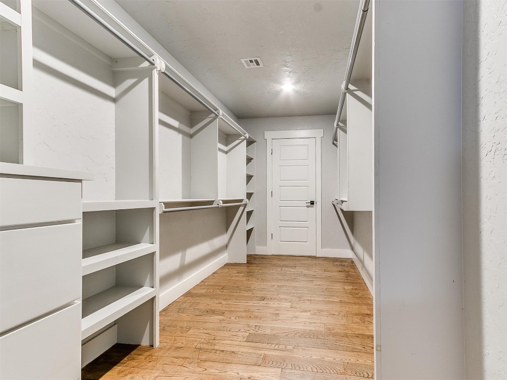 2892 Rustic View Drive, Goldsby, OK 73093 walk in closet featuring light wood-type flooring