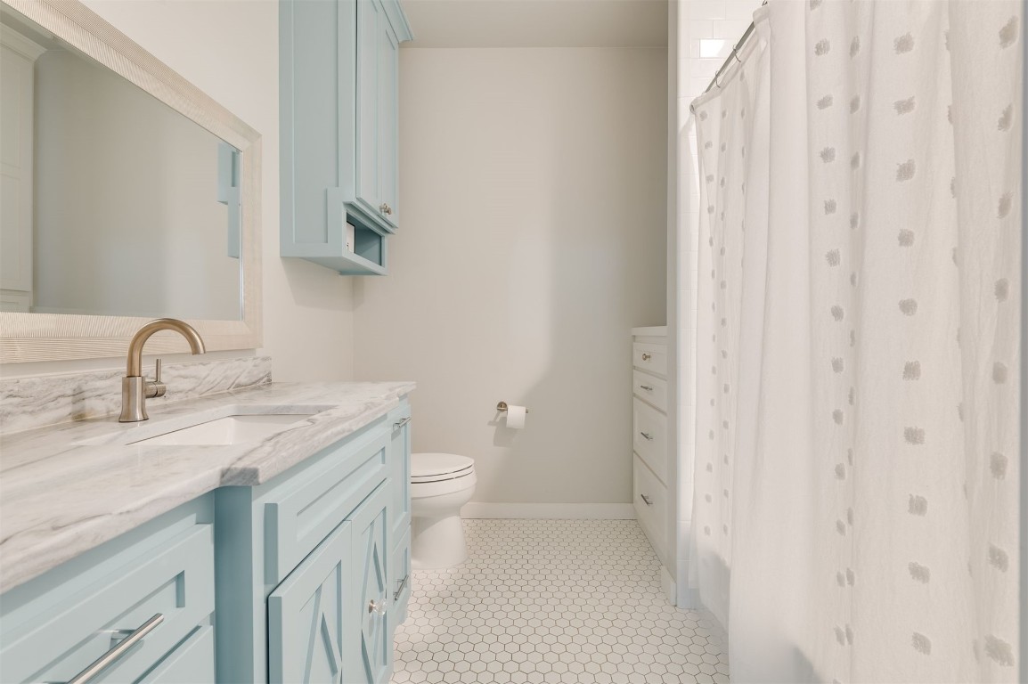 9301 Farmhouse Lane, Arcadia, OK 73007 bathroom featuring vanity, toilet, and tile floors