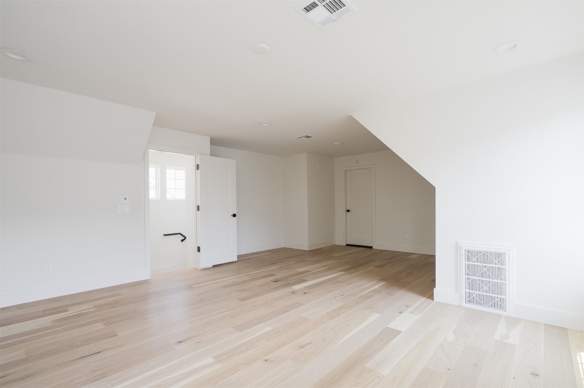 1207 NW 42nd Streets, Oklahoma City, OK 73118 bonus room with light wood-type flooring