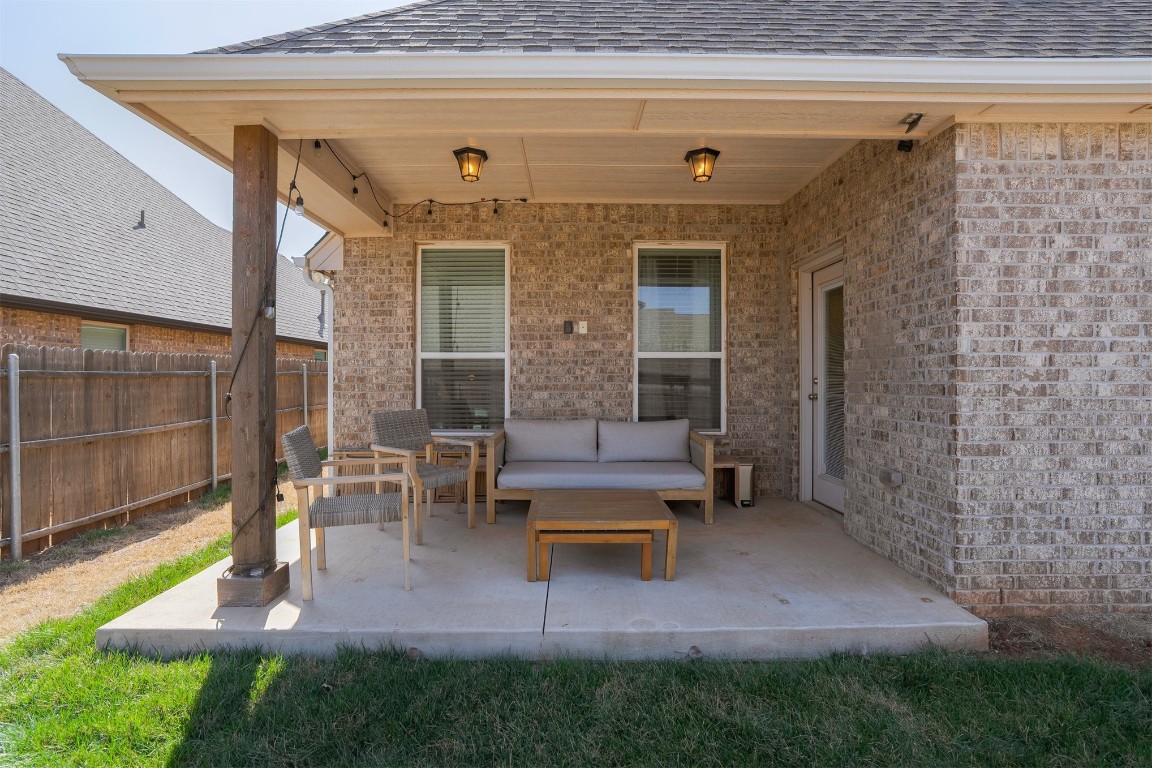 5305 NW 162nd Terrace, Edmond, OK 73013 view of terrace with an outdoor hangout area