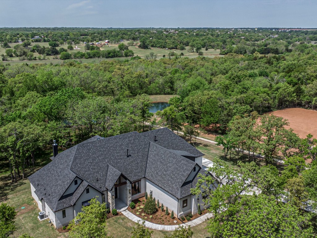 4217 Grand Timber Drive, Edmond, OK 73034 view of drone / aerial view