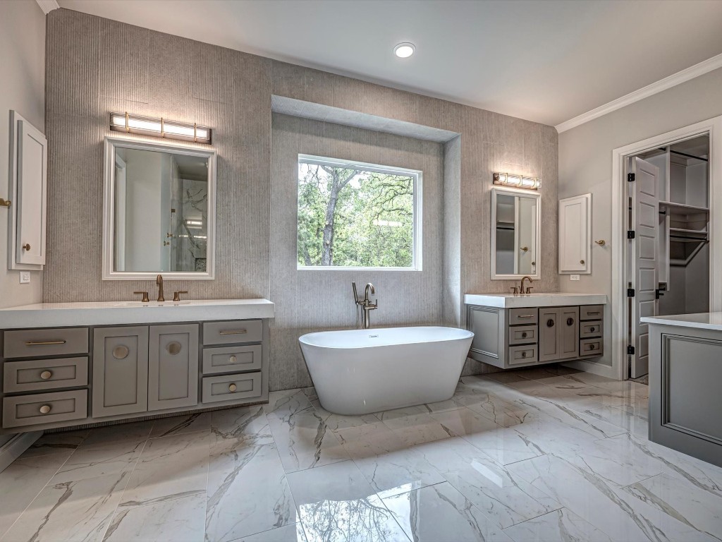 4217 Grand Timber Drive, Edmond, OK 73034 bathroom featuring tile flooring, tile walls, and dual vanity