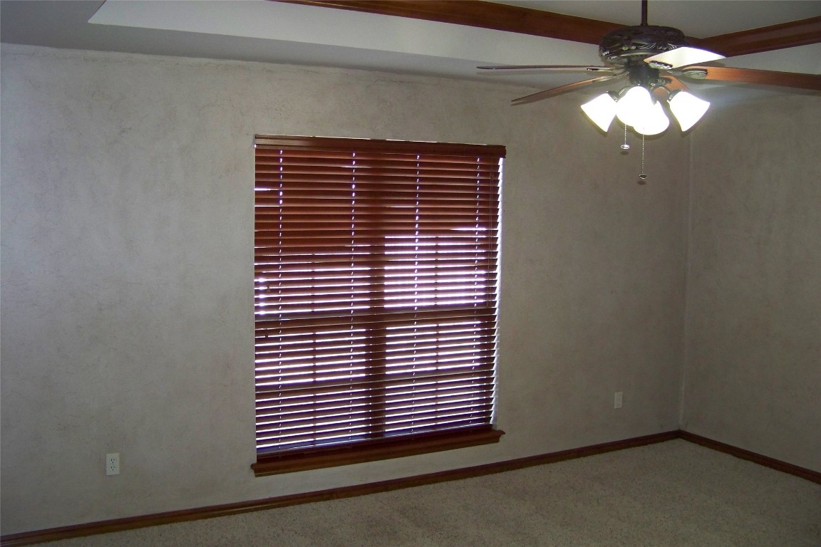 8317 NW 62nd Street, Oklahoma City, OK 73132 carpeted spare room featuring ceiling fan