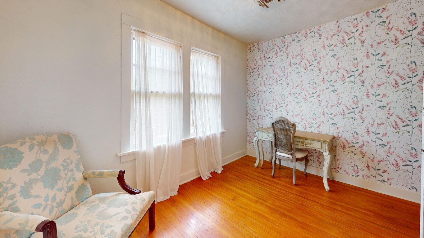 Address Hidden sitting room featuring light hardwood / wood-style floors and plenty of natural light