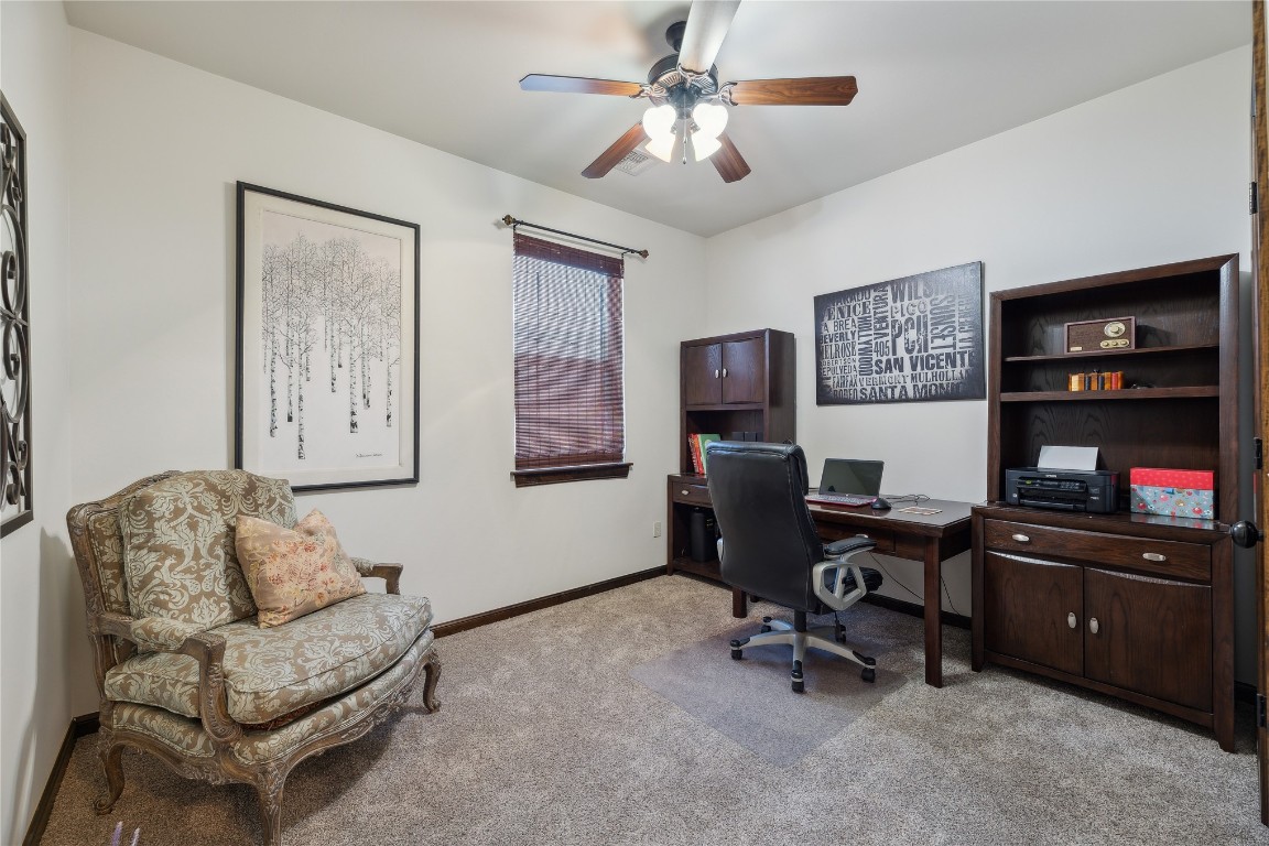 2147 Bridgeview Boulevard, Edmond, OK 73003 carpeted office space featuring ceiling fan