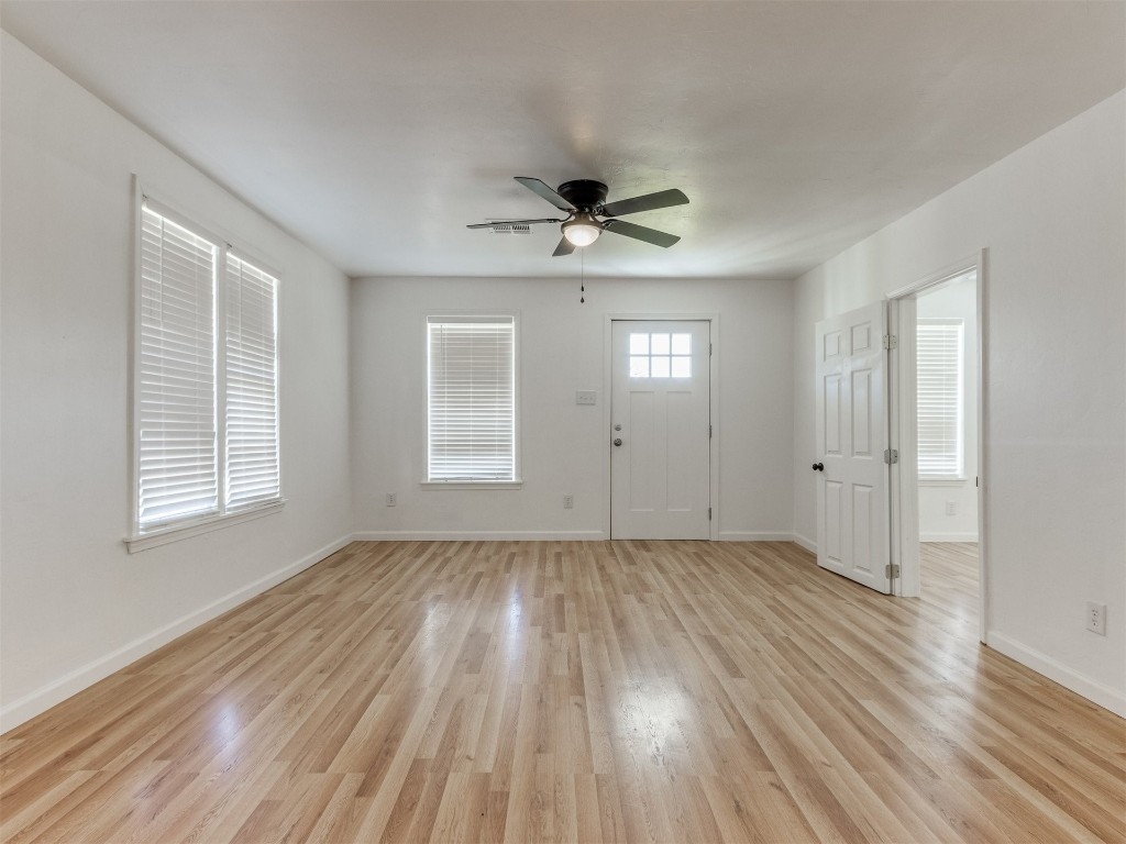 405 S Drexel Street, Guthrie, OK 73044 empty room featuring light hardwood / wood-style flooring and ceiling fan