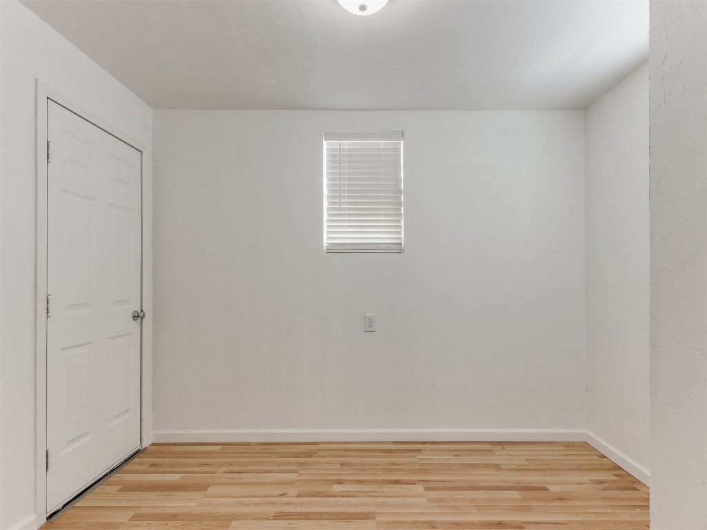 405 S Drexel Street, Guthrie, OK 73044 spare room featuring light hardwood / wood-style flooring