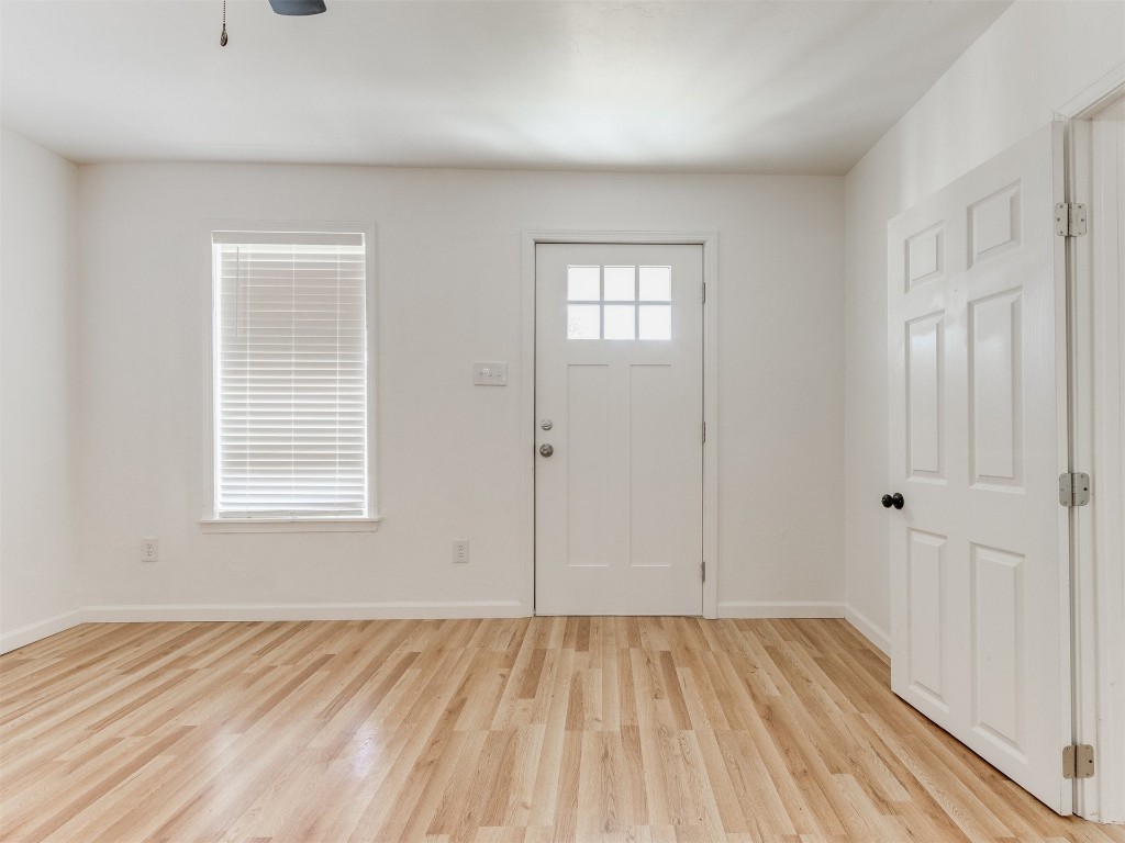 405 S Drexel Street, Guthrie, OK 73044 unfurnished room featuring light hardwood / wood-style flooring and ceiling fan
