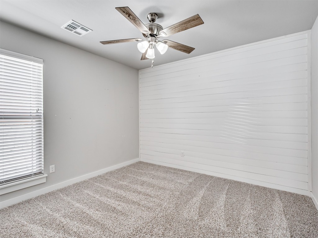 515 Isabella Drive, Blanchard, OK 73010 carpeted empty room with ceiling fan