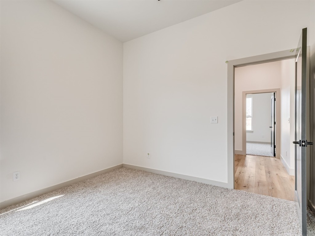 118 NE Primrose Point Avenue, Piedmont, OK 73128 unfurnished room with light hardwood / wood-style flooring