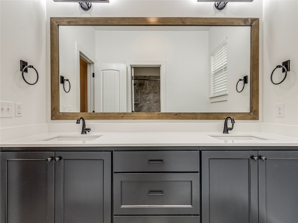 143 Primrose Point Avenue, Piedmont, OK 73078 bathroom featuring oversized vanity and double sink