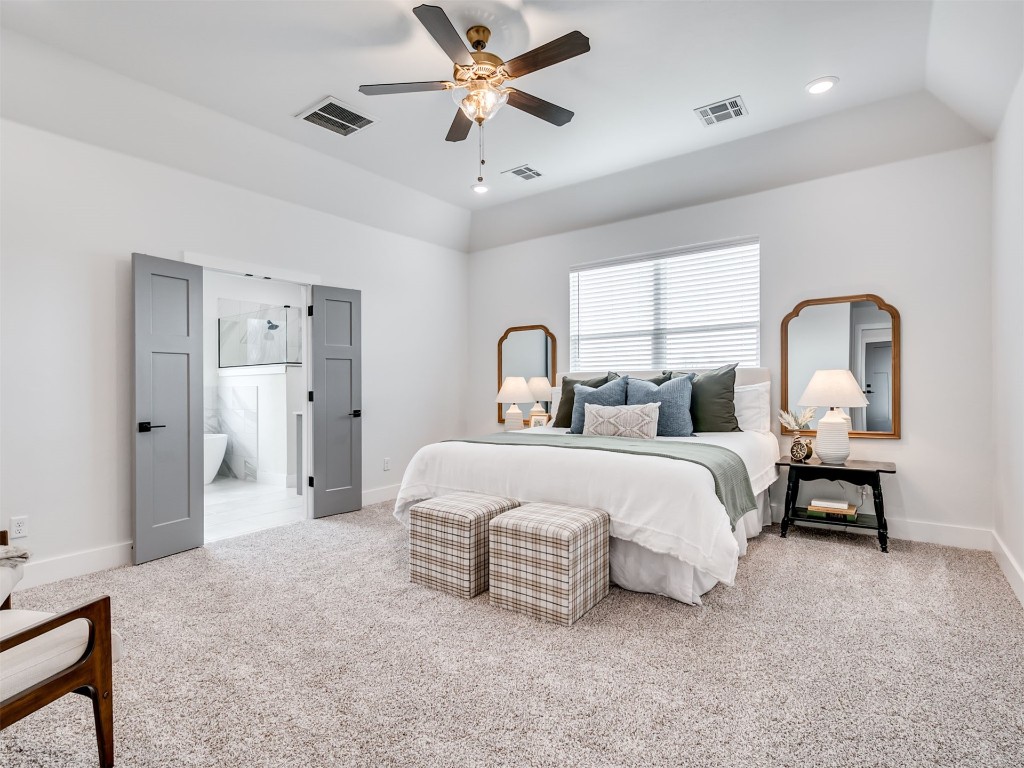 446 Venetian Avenue, Piedmont, OK 73078 carpeted bedroom featuring vaulted ceiling and ceiling fan