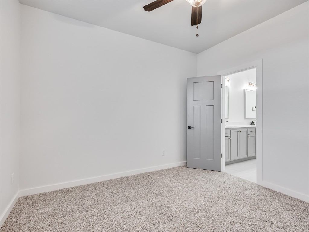 446 Venetian Avenue, Piedmont, OK 73078 carpeted empty room featuring ceiling fan