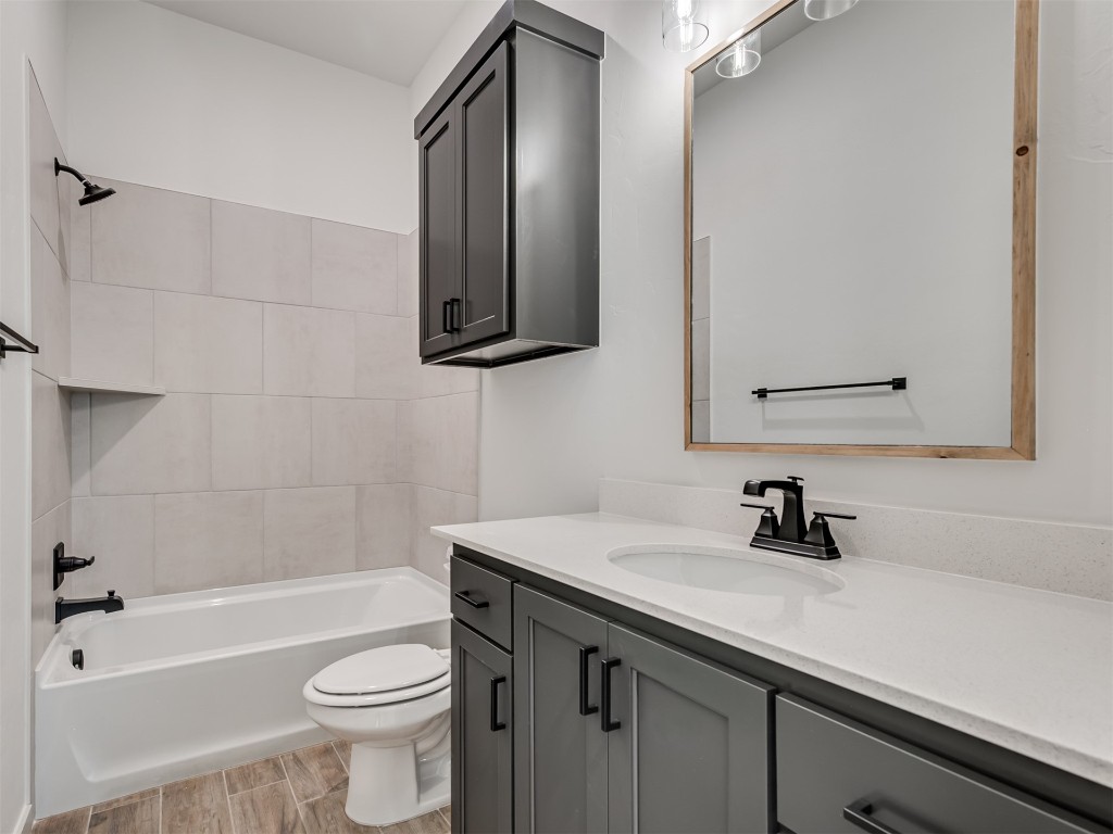 508 Venetian Avenue, Piedmont, OK 73078 bathroom featuring wood-type flooring and vanity