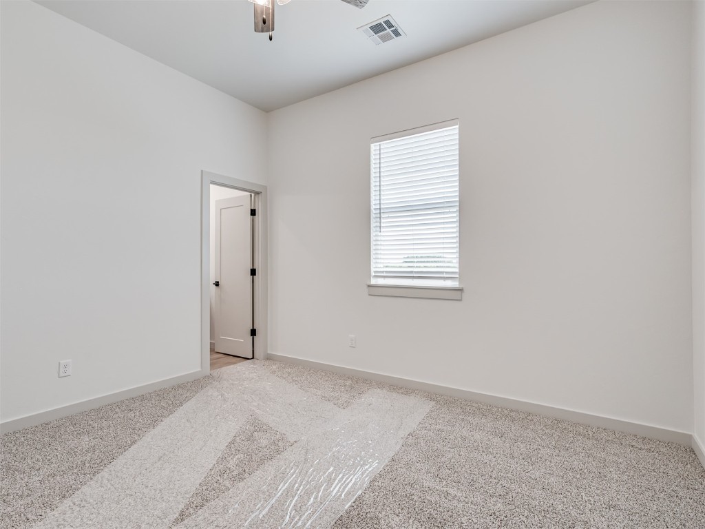 508 Venetian Avenue, Piedmont, OK 73078 carpeted empty room with ceiling fan