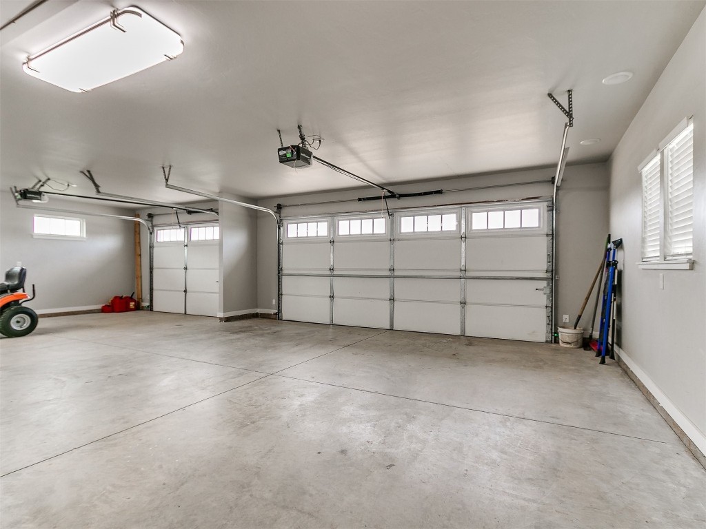26812 Bridlewood Road, Blanchard, OK 73010 garage featuring a garage door opener