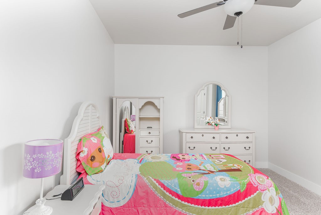 20498 SE 119th Street, McLoud, OK 74851 bedroom featuring ceiling fan and carpet floors