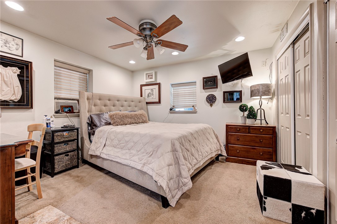 7900 N Bryant Avenue, Oklahoma City, OK 73131 carpeted bedroom with ceiling fan