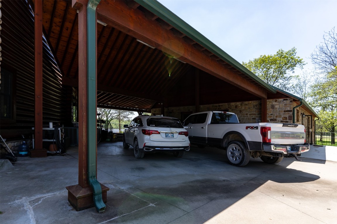 32101 W 256th, #S, Bristow, OK 74010 view of vehicle parking with a carport