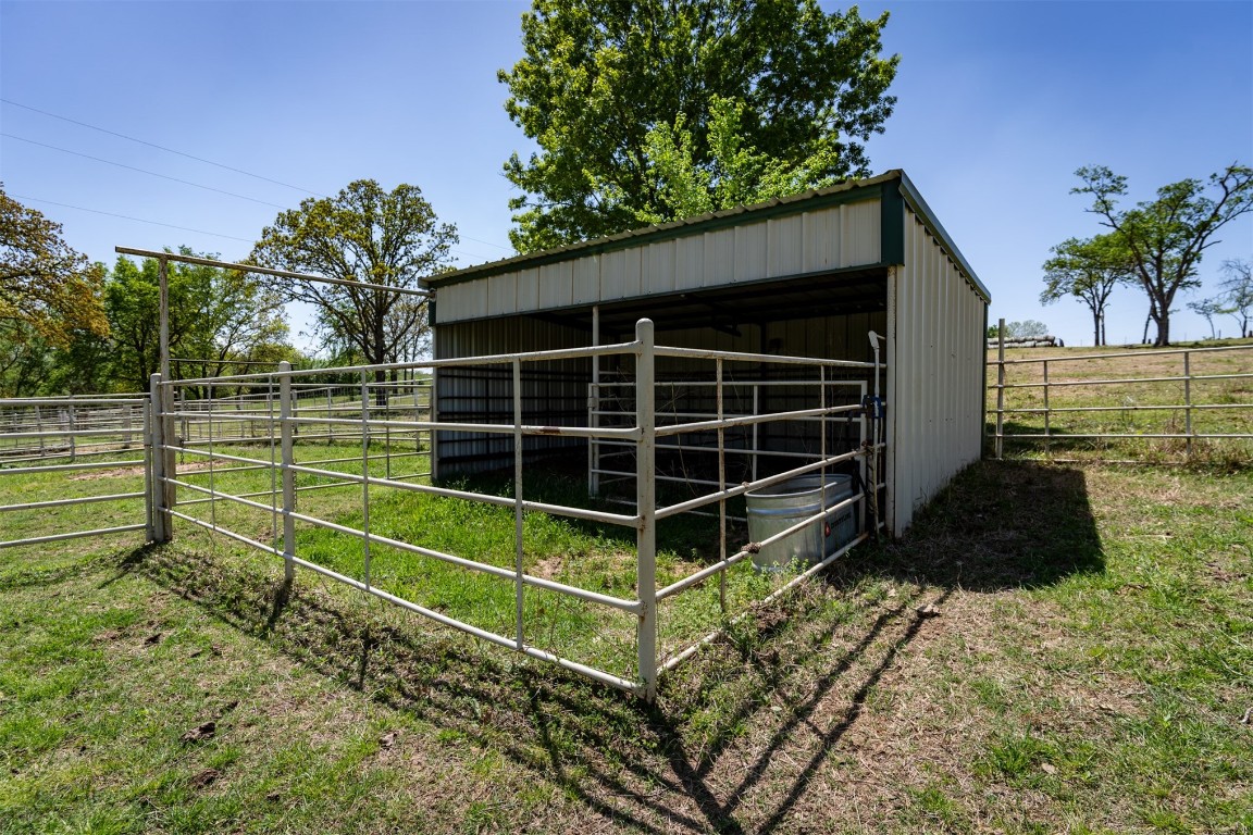 32101 W 256th, #S, Bristow, OK 74010 view of horse barn featuring a lawn and an outdoor structure