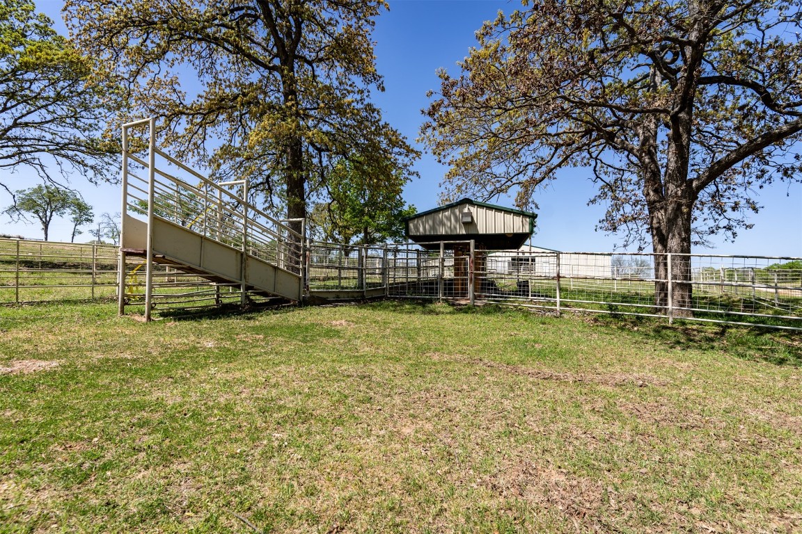 32101 W 256th, #S, Bristow, OK 74010 view of yard featuring a rural view and an outdoor structure