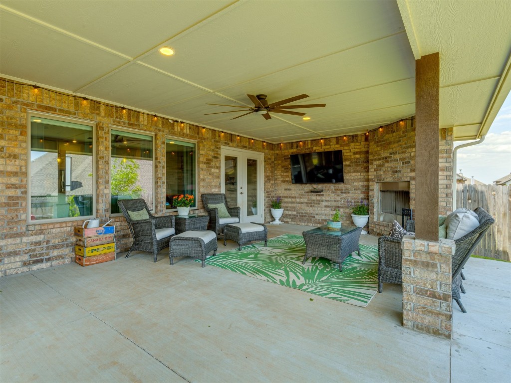 11812 Kylie Elizabeth Road, Yukon, OK 73099 view of terrace featuring ceiling fan and outdoor lounge area