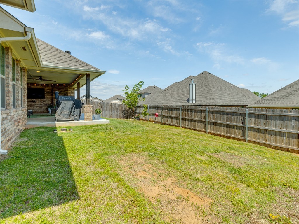 11812 Kylie Elizabeth Road, Yukon, OK 73099 view of yard with a patio area and ceiling fan