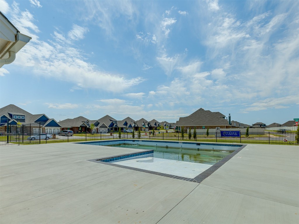 11812 Kylie Elizabeth Road, Yukon, OK 73099 view of swimming pool with a patio