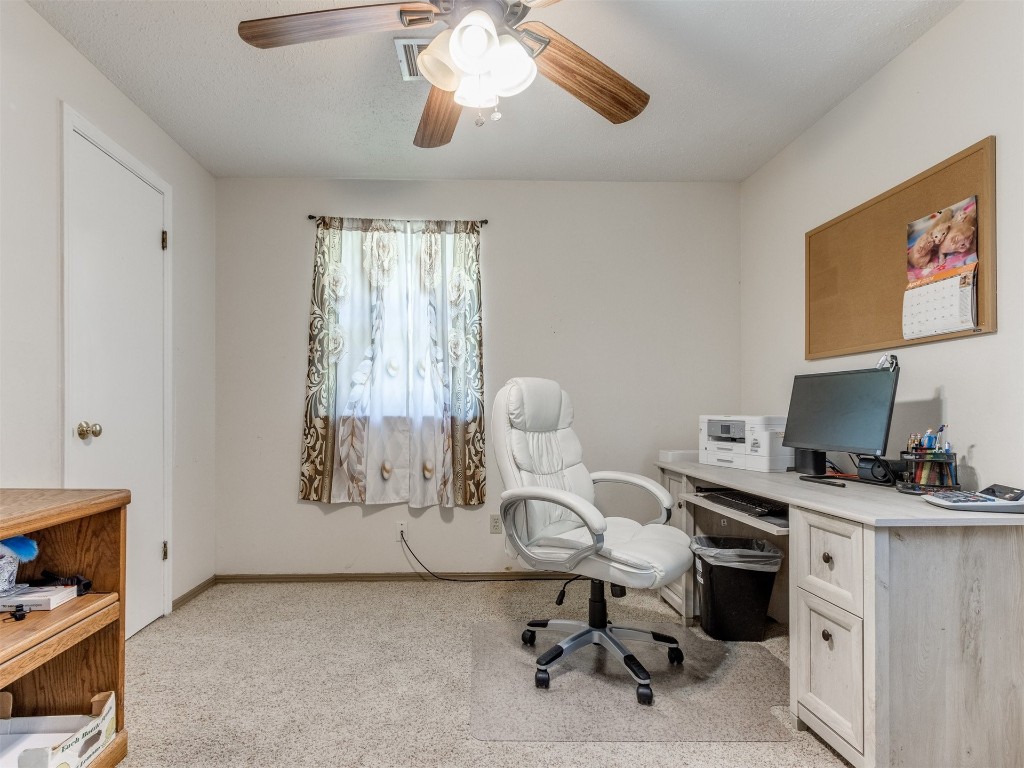 5216 S Briarwood Drive, Oklahoma City, OK 73135-1412 carpeted office featuring ceiling fan