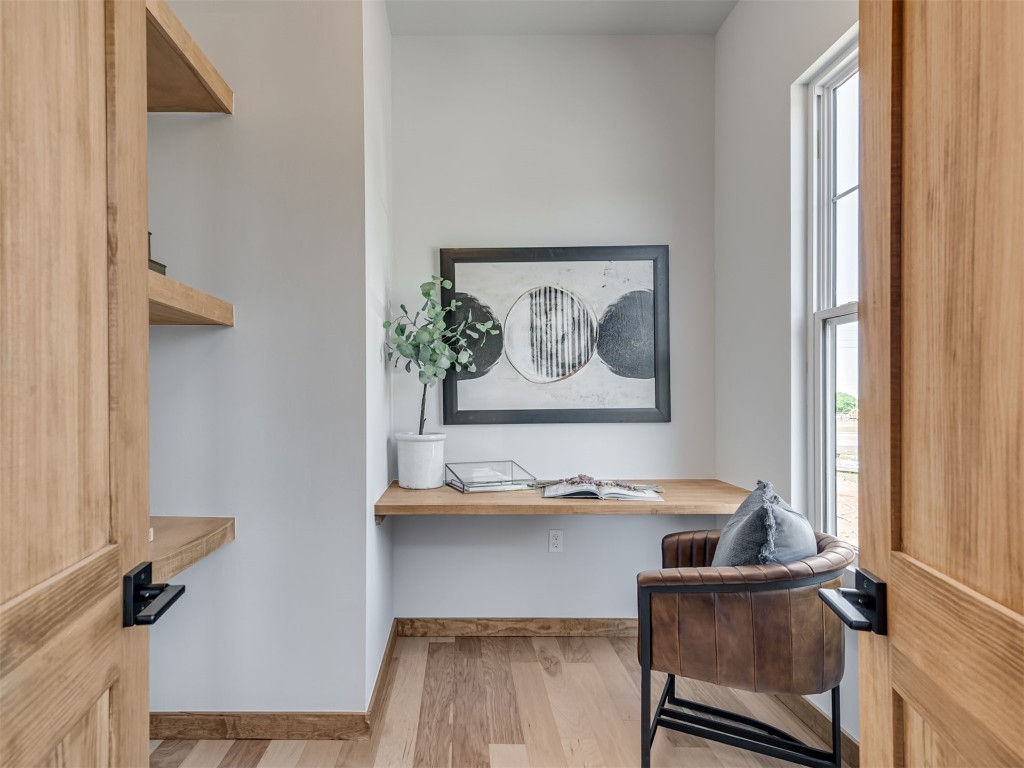 730 W Hurd Street, Edmond, OK 73003 home office with light wood-type flooring