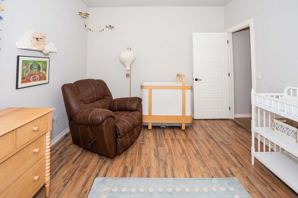 2508 Thornberry Lane, Yukon, OK 73099 sitting room with hardwood / wood-style floors