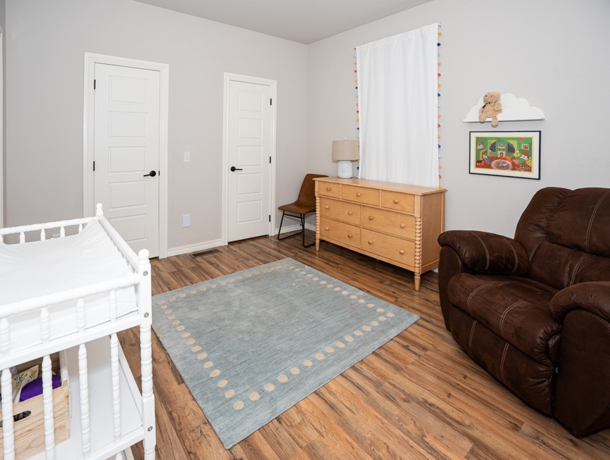 2508 Thornberry Lane, Yukon, OK 73099 bedroom featuring hardwood / wood-style flooring