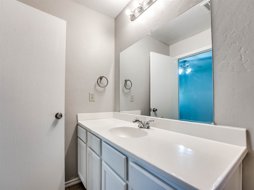 8613 SW 46th Place, Oklahoma City, OK 73179 bathroom with large vanity