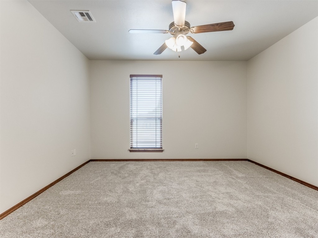 1015 Turkey Hollow Trail NE, Piedmont, OK 73078 carpeted spare room featuring ceiling fan