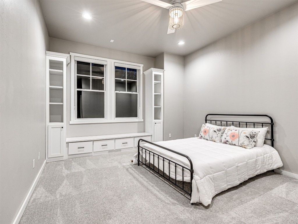 9724 Farmhouse Lane, Arcadia, OK 73007 carpeted bedroom featuring ceiling fan